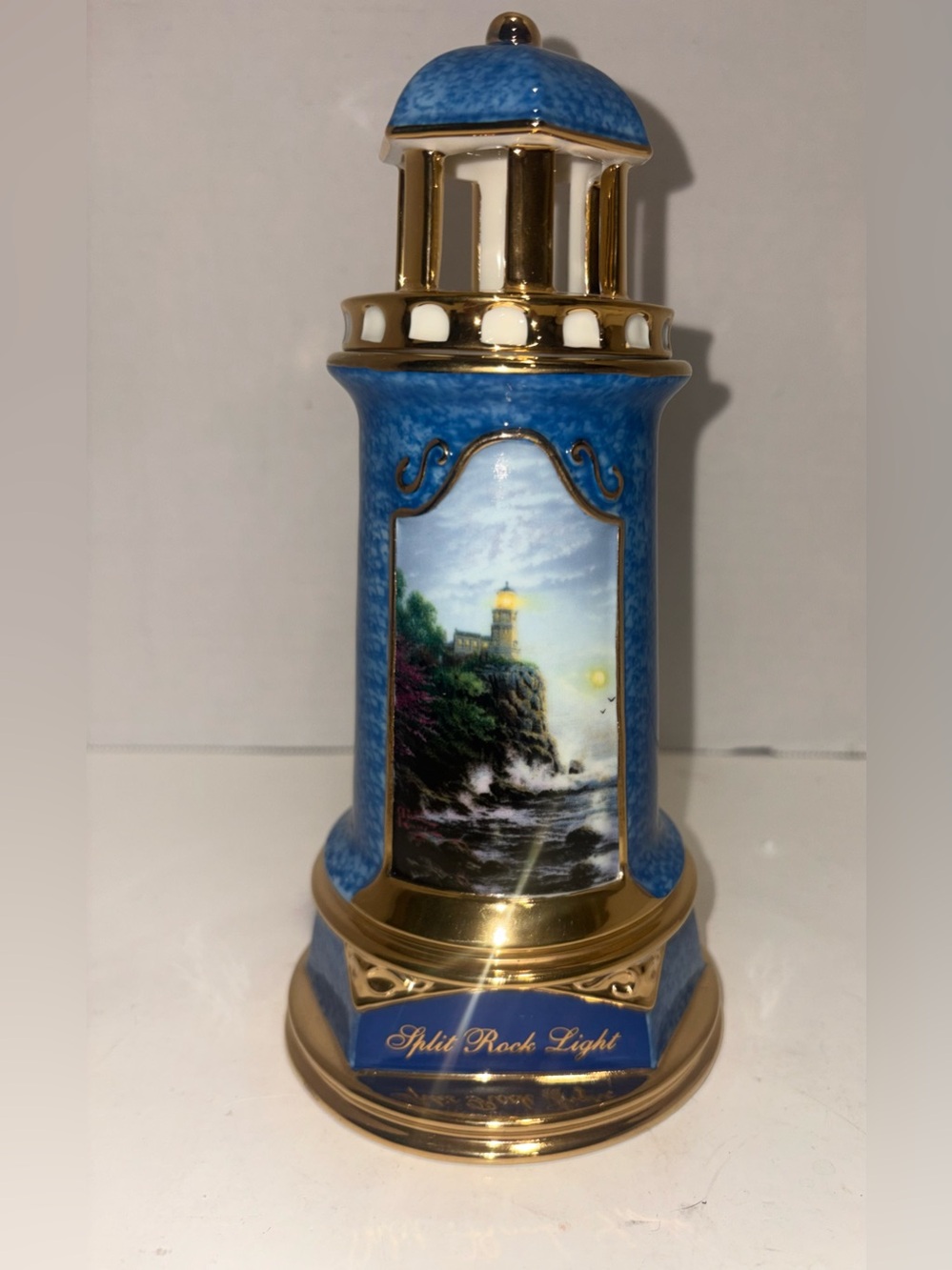 Thomas Kinkade Blue and Gold Lighthouse Figurine - Vintage